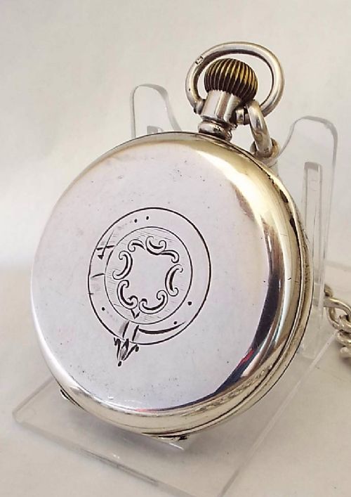 fig 1. 1914 silver pocket watch and chain.
