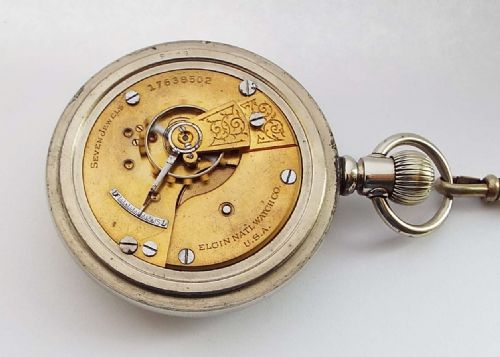 fig 3. A large 1914 Elgin pocket watch & chain.