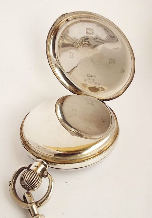 fig 2. A silver 1930s Swiss pocket watch and chain.