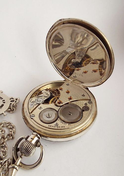 fig 3. A silver 1930s Swiss pocket watch and chain.