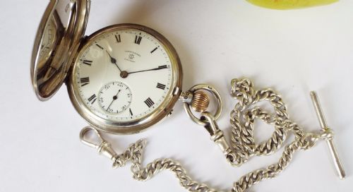 fig 5. 1928 Rotherhams silver hunter pocket watch and chain