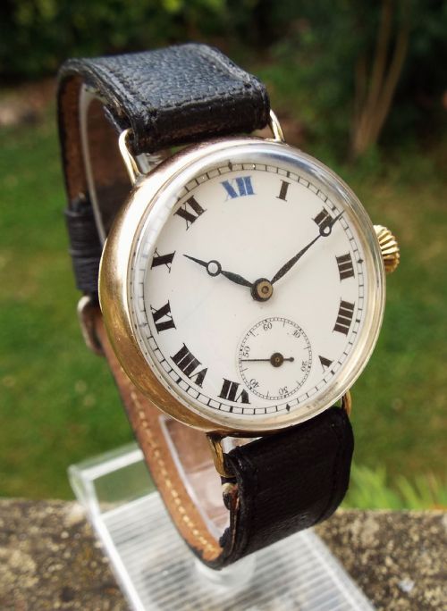 fig 1. Gents 9ct gold trench style watch, 1922