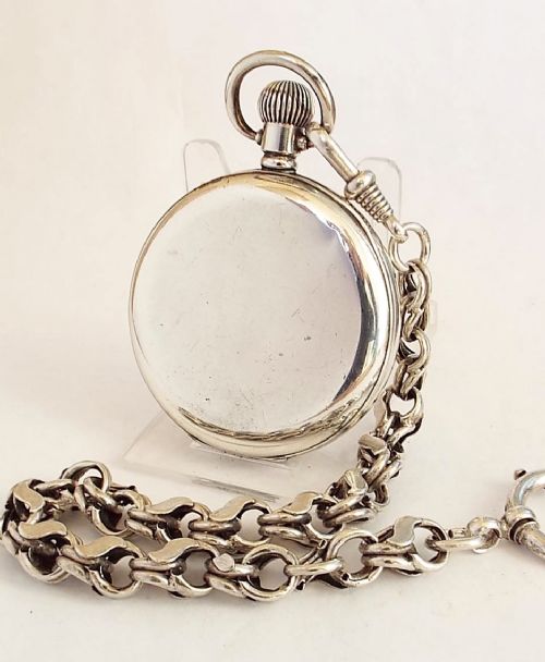 fig 1. 1919 silver pocket watch and chain.