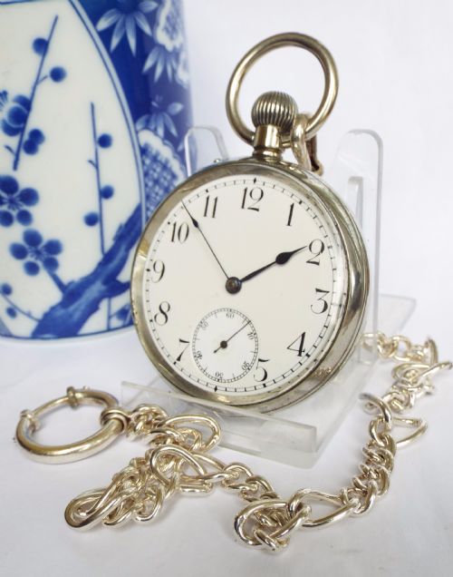 fig 1. An antique 1908 Eterna pocket watch with chain