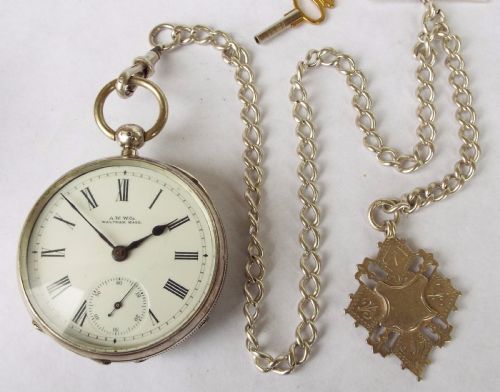 fig 1. Antique Waltham silver pocket watch with chain