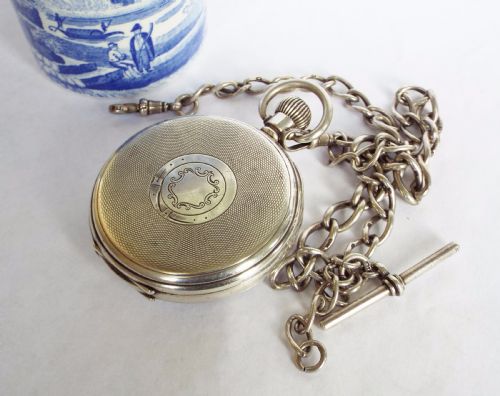fig 2. 1921 silver open faced pocket watch and chain
