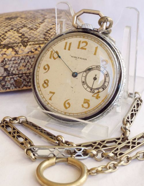 fig 1. A Waltham pocket watch, 1909, with chain