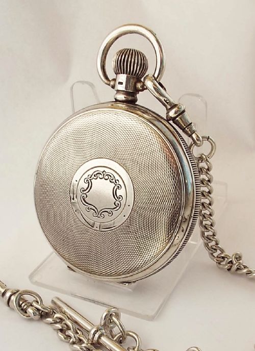 fig 1. Antique 1926 silver English Lever pocket watch, with 1926 albert chain.