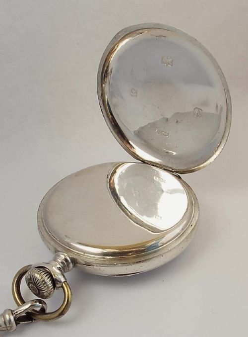 fig 3. A 1920s silver Waltham pocket watch & chain.