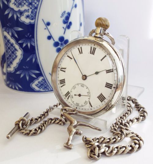 An Antique Silver Record Pocket Watch with Chain
