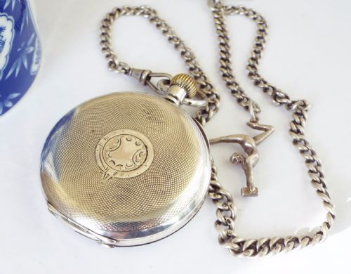 fig 2. An antique silver Record pocket watch with chain