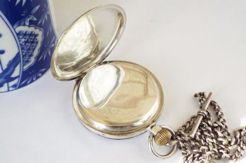 fig 3. An antique silver Record pocket watch with chain