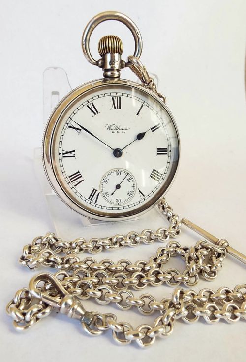 A 1920s Silver Waltham Pocket Watch & Chain.
