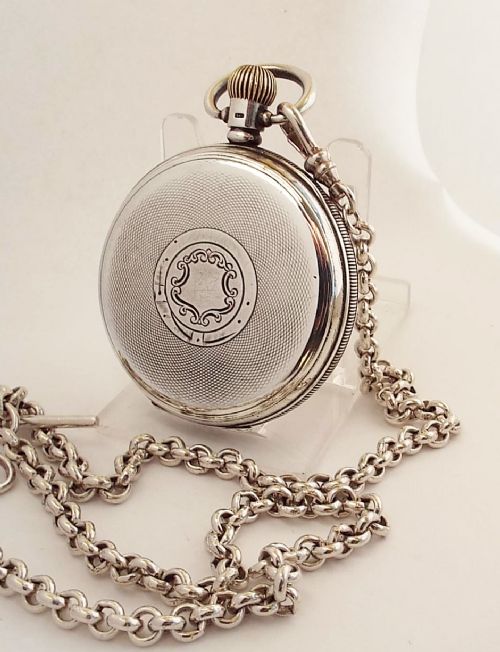 fig 1. A 1920s silver Waltham pocket watch & chain.