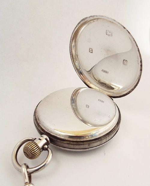 fig 2. A 1920s silver Waltham pocket watch & chain.