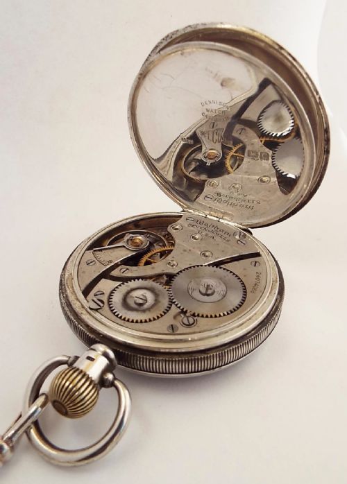 fig 3. A 1920s silver Waltham pocket watch & chain.