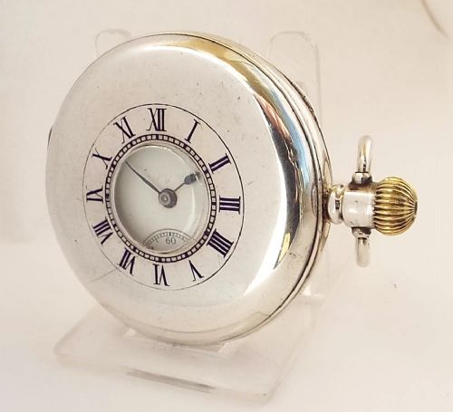 A Waltham Traveler Silver Half Hunter Pocket Watch