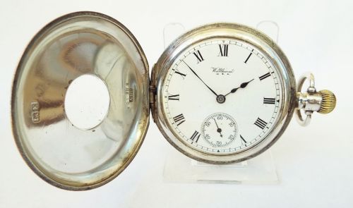fig 1. A Waltham Traveler silver half hunter pocket watch