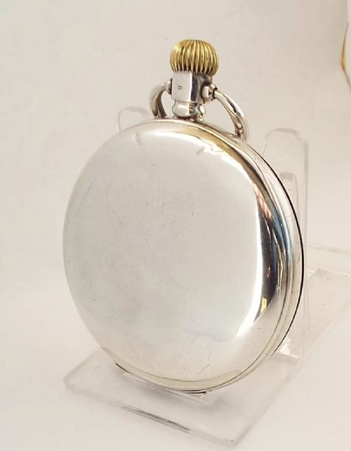 fig 2. A Waltham Traveler silver half hunter pocket watch