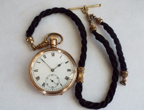 fig 1. 1930s Satisfaction watch and horse hair albert
