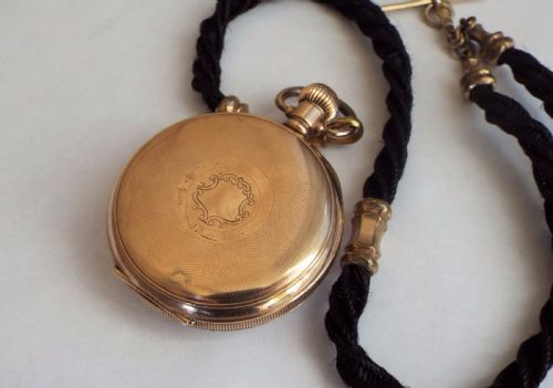 fig 2. 1930s Satisfaction watch and horse hair albert