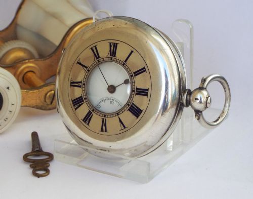 An Antique Silver Half Hunter Pocket Watch
