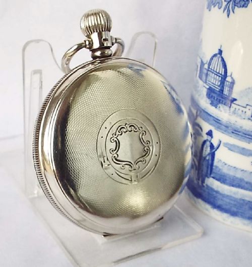 fig 1. An antique silver Waltham Traveler pocket watch.