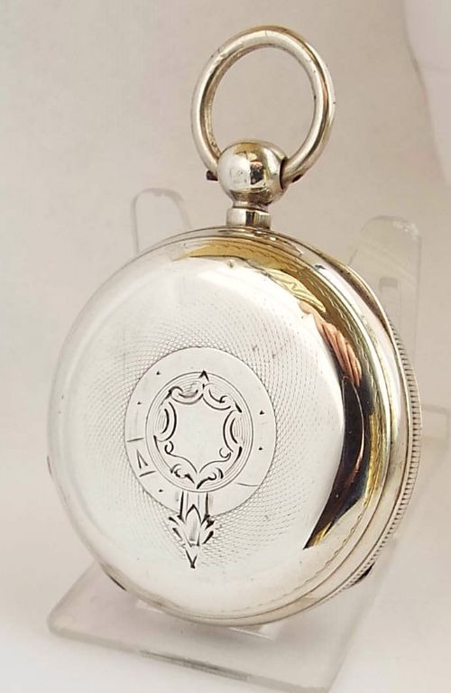 fig 1. An antique silver Waltham pocket watch.