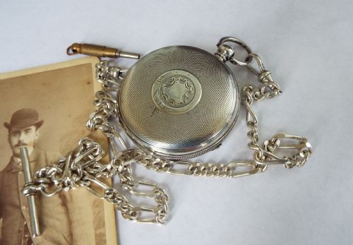 fig 2. 1909 Kays Triumph silver pocket watch with albert