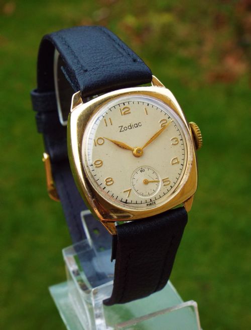 fig 1. 9ct gold mid-size Zodiac cushion cased wrist watch