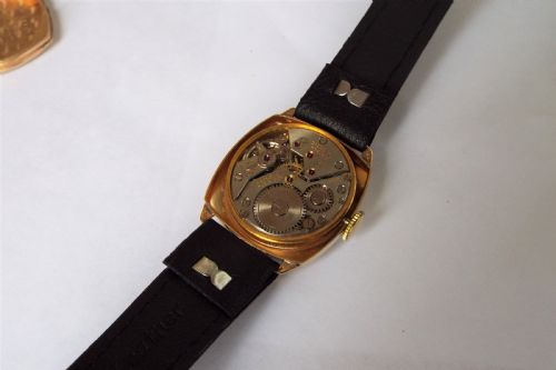 fig 2. 9ct gold mid-size Zodiac cushion cased wrist watch
