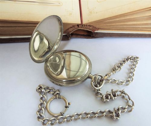 fig 2. 1930s Omega pocket watch and chain