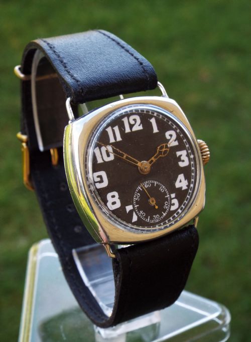 fig 1. Gents silver cushion cased wrist watch, 1924