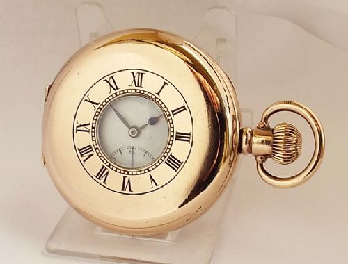 A 1920s Swiss Half Hunter Pocket Watch.