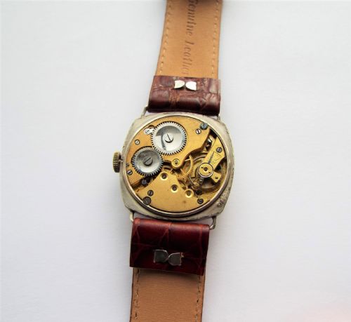 fig 5. Gents silver watch with William Morris history