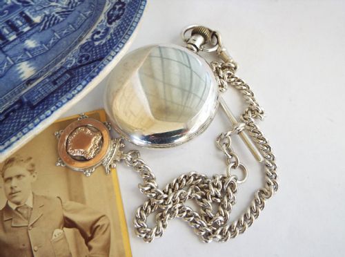 fig 1. 1927 silver Revue pocket watch with chain