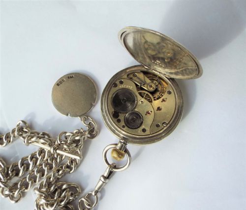 fig 4. Silver hunter Brandt Omega pocket watch & chain