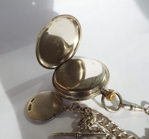 fig 5. Silver hunter Brandt Omega pocket watch & chain