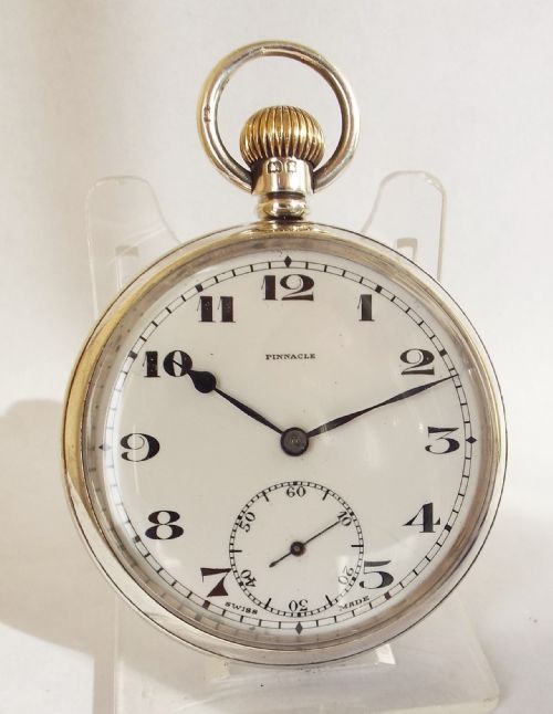 A 1932 Silver Pinnacle Stem Winding Pocket Watch.