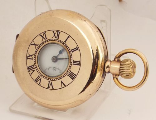 A 1920s Cyma Half Hunter Pocket Watch.