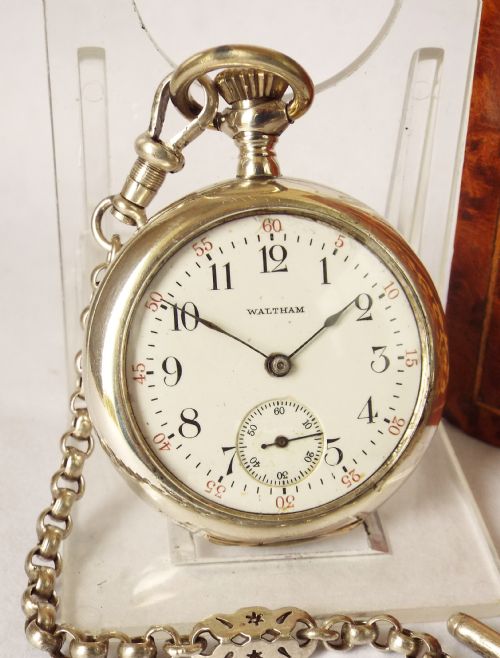 fig 1. A ladies silver antique Waltham fob watch with albertina.