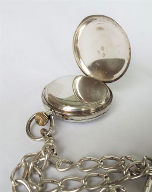 fig 1. Antique silver Errington pocket watch, 1893, and single albert