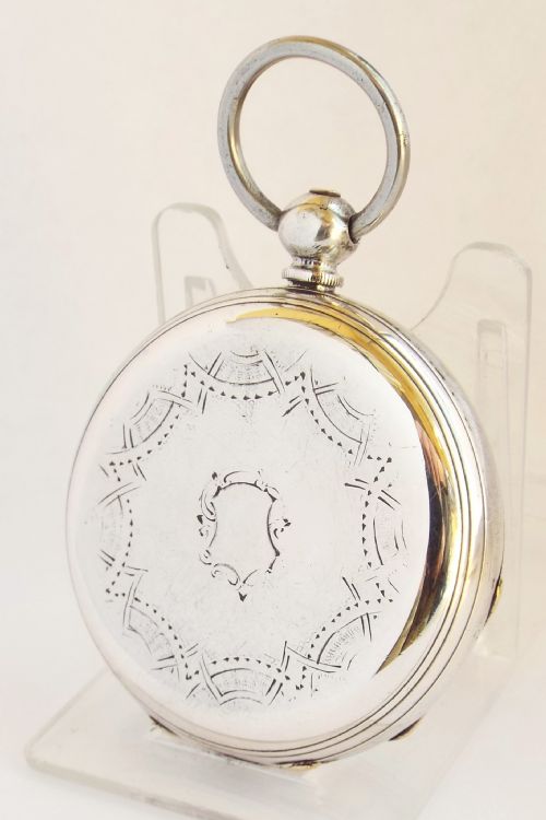 fig 1. Antique key winding white metal pocket watch.