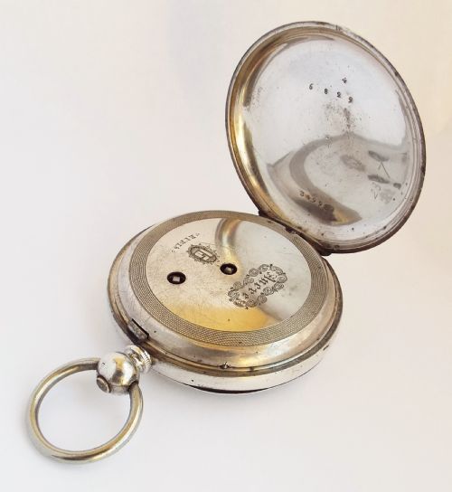 fig 2. Antique key winding white metal pocket watch.