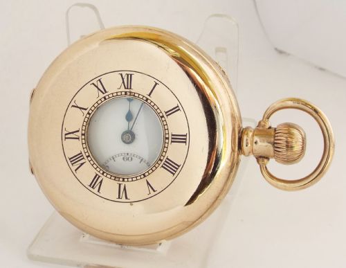 A 1920s Swiss Half Hunter Pocket Watch.