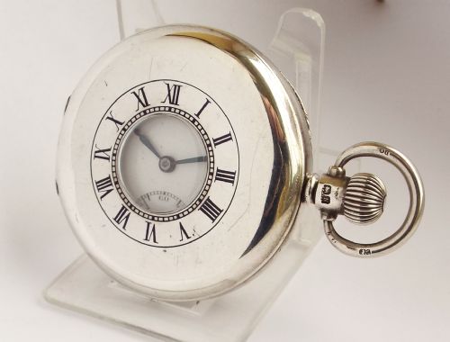 A 1930s Silver Half Hunter Record Pocket Watch.
