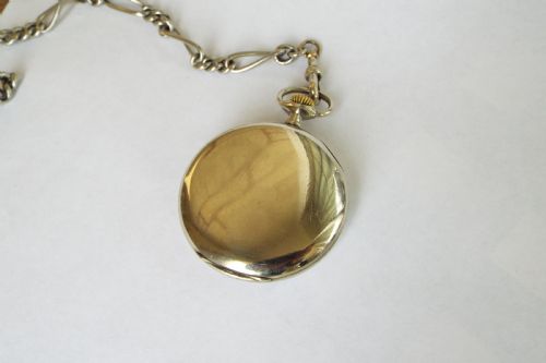 fig 1. 1930s Omega pocket watch and double albert