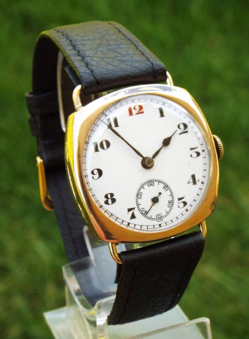 fig 1. Gents 9ct rose gold cushion case wrist watch, 1929