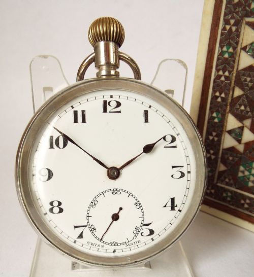 A 1920 Silver Stem Winding Pocket Watch.