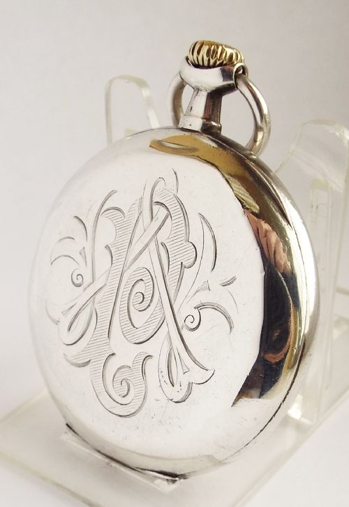 fig 1. An antique silver Omega pocket watch, c1900s